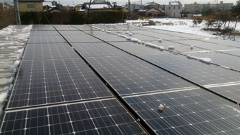 Snow cleared solar panels in Takasaki