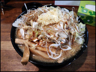 Super thick noodles, black shredded green onions, boiled cured egg, extra thick bamboo shoots, and lots of garlic. It had been a while, but it was as great as I remembered it.